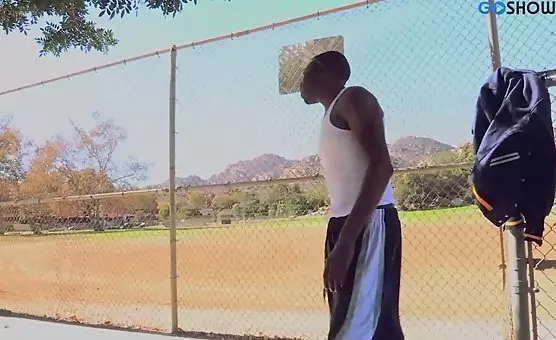 Two darkskinned men and a brunette cheerleader indulge in kinky group sex