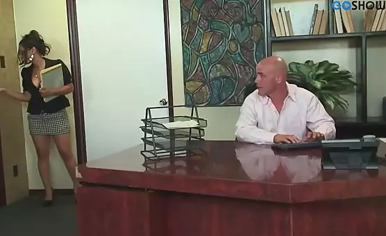 Erotic secretary gets intimate with boss in a steamy office scene