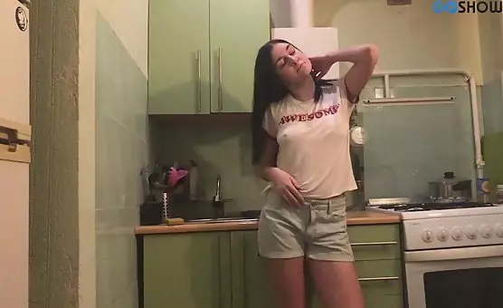 Sexy Brunette Teases and Undresses for Her Man in the Kitchen